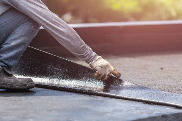 Professional Basement Waterproofing technician working in Highlands, NC